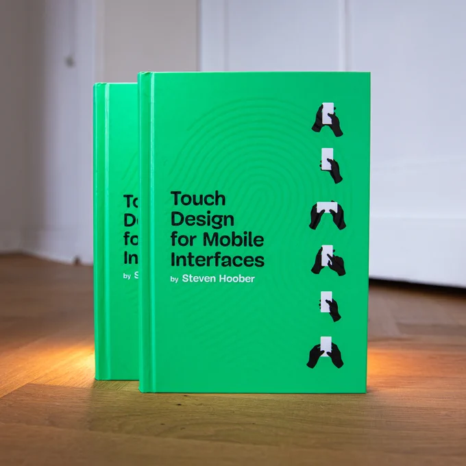 A green cover with a fingerprint on the new Smashing Book