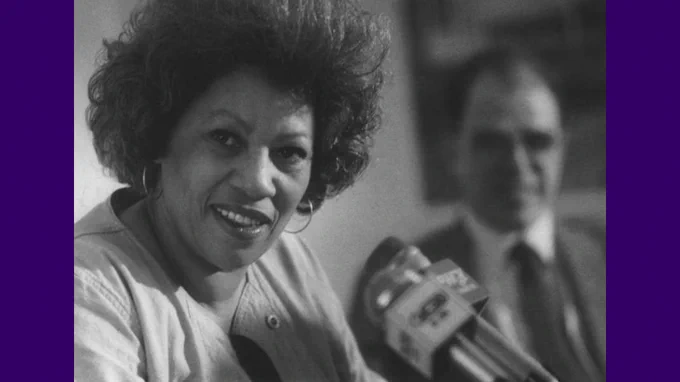 Toni Morrison speaks at the University at Albany in 1984, with Writers Institute founder William Kennedy in the background at right. (Fred McKinney / Albany Times Union file photo)