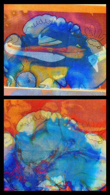 Fabric with printed amorphous shapes and lines in oranges, blues and yellows.