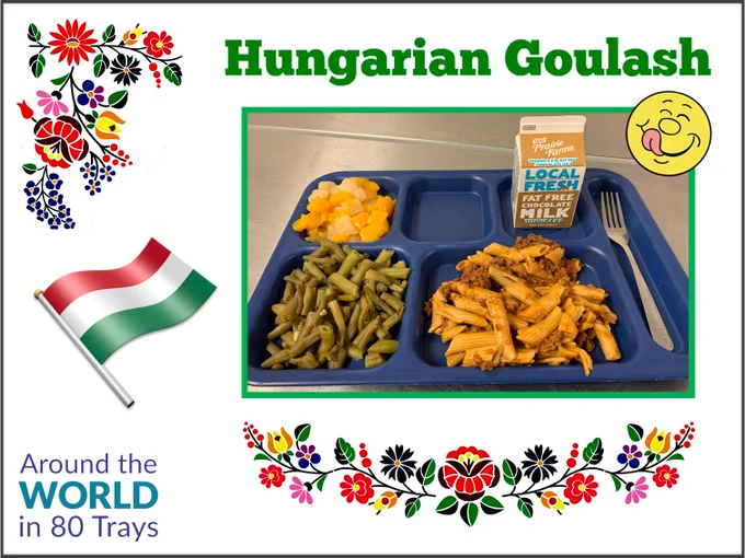 A lunch tray is loaded up with Hungarian Goulash, green beans, fruit, and a carton of milk. Text reads: "Hungarian Goulash. Around the World in 80 Trays".