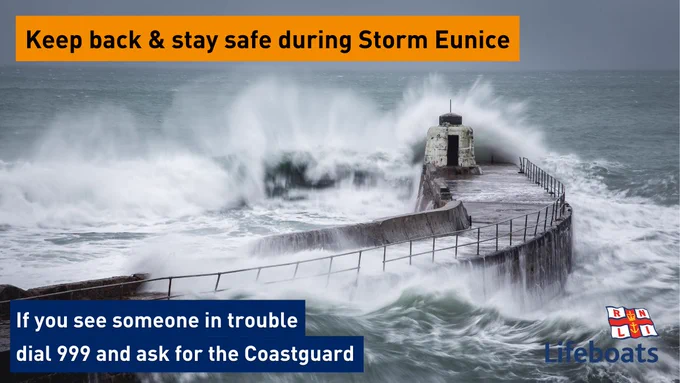A photo of storm waves breaking on a sea wall