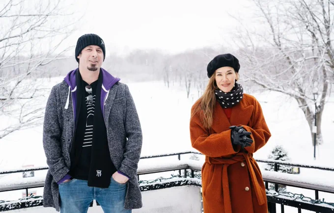 Sapin and Jade standing outside in the snow.