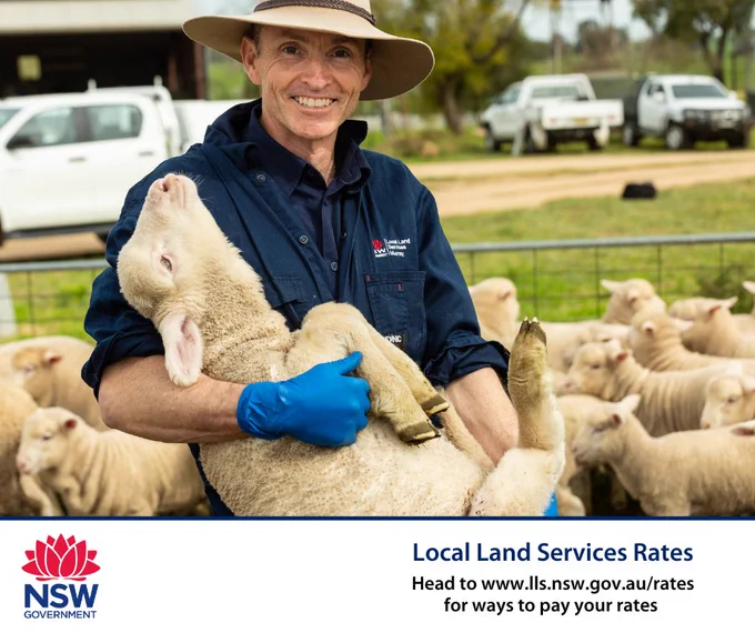 Man in Local Land Services shirt, smiling at the viewer. He is wearing a wide brim hat and holding a small lamb.
Local Land Services rates 
Head to www.lls.nsw.gov.au/rates for way to pay your rates 