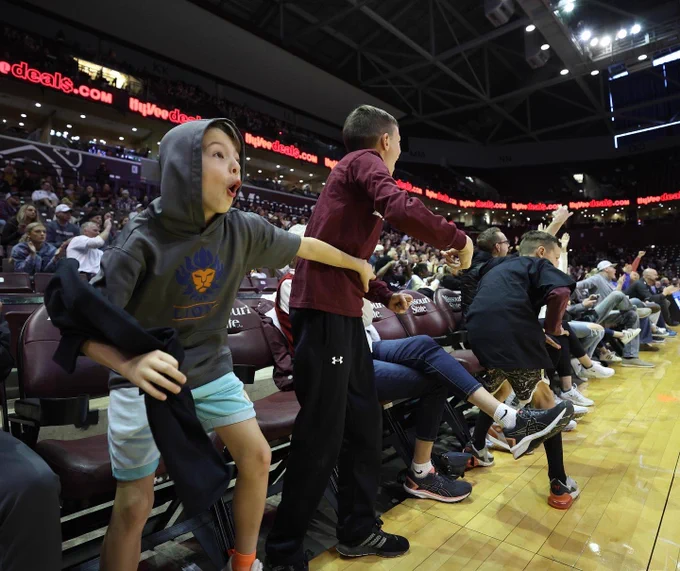 Kids react to a shot
