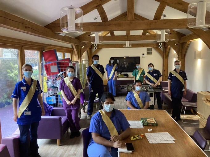 Mixed bag of multiple professionals of all flavours scrubbed and sashed in gold