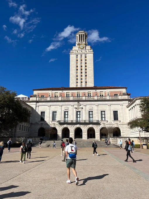 UT students on campus in front of the tower