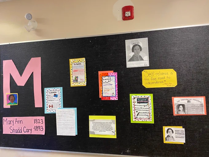Bulletin board with photos and info about Mary Ann Shadd Cary. 