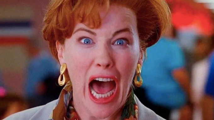 Catherine O'Hara in Home Alone 2. She is looking into the camera and screaming.