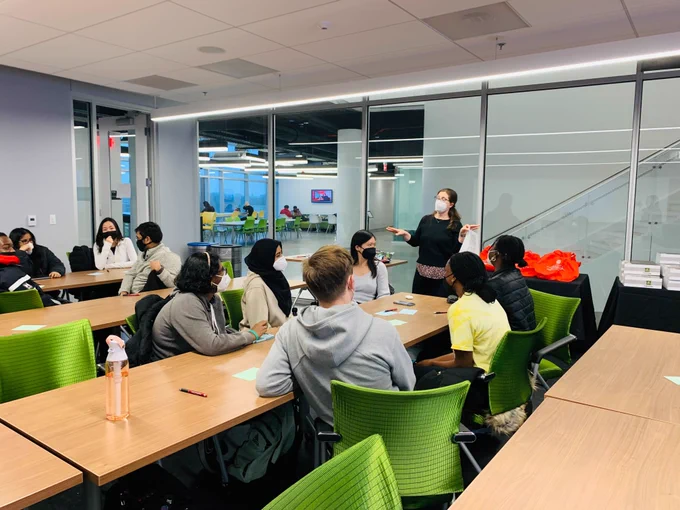 Break Through Tech Community Engagement Coordinator Amy Vaillancourt presents to group of mentees in Iribe Center classroom.