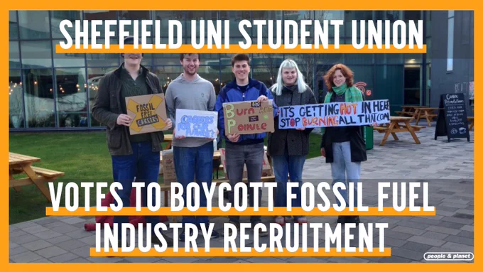 5 students holding Fossil Free Careers placards outside Sheffield University with the text overlay 'Sheffield Uni Student Union votes to boycott fossil fuel industry recruitment'