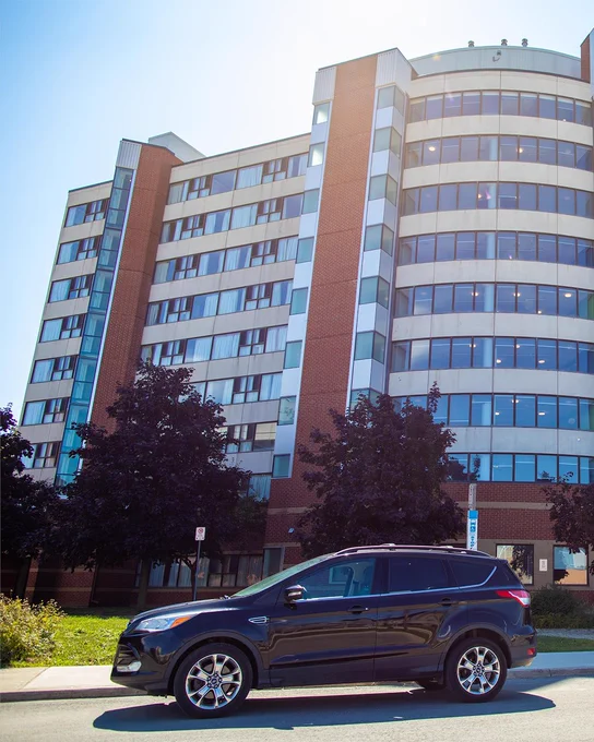 An SUV in front of Humber's residence building at North Campus.