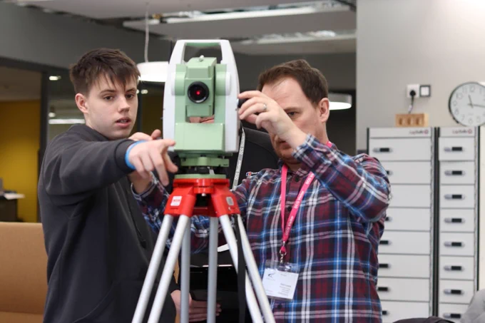Sam from Greenhatch lines up apparatus with a student.