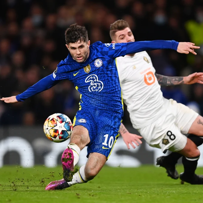 Christian Pulisic kicking the ball for a goal in a match against Lille.