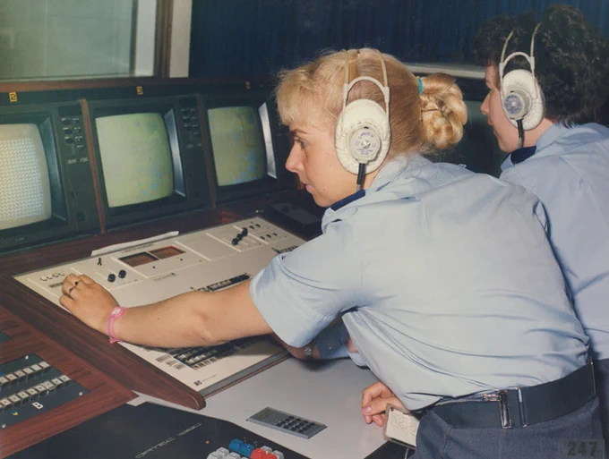 Image shows female personnel working with headset on.