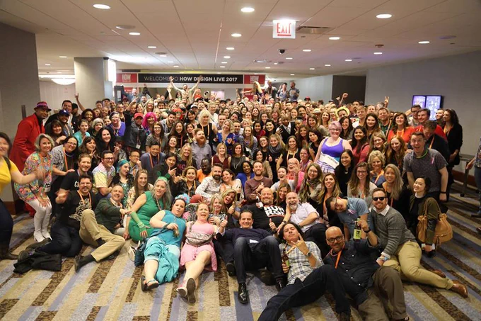 Hundreds of exhausted (and probably a little drunk), happy people pose for a massive selfie after dancing at the closing party for the HOW Design Live Conference.