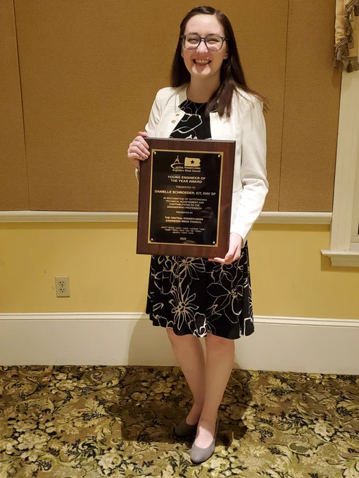 Photo of me holding plaque
