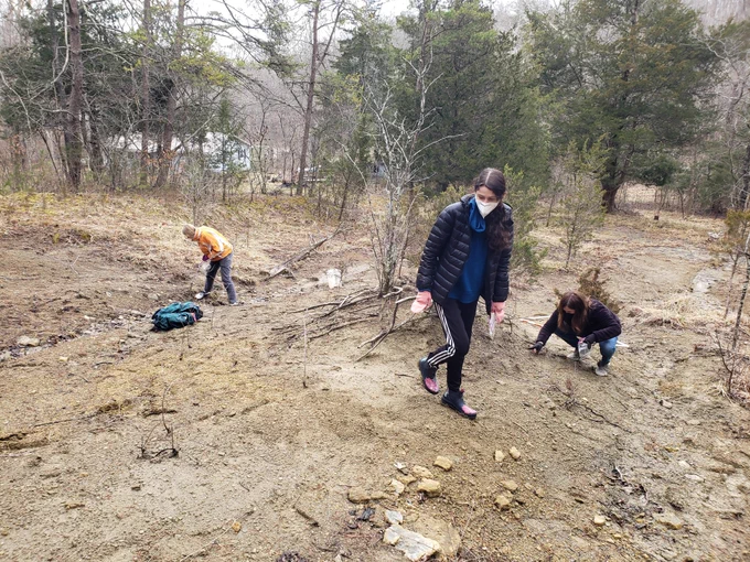students surface collecting fossils