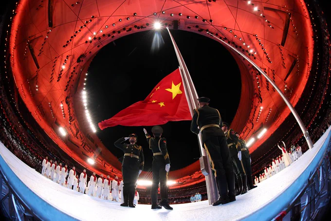 China flag is raised with their athletes lining up