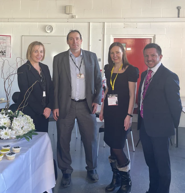 Vicky with principal and vice principals of Lewisham College
