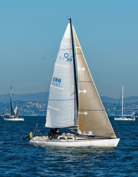 Sailboat "Warpath" and Olson 30 sailing on the San Francisco Bay.