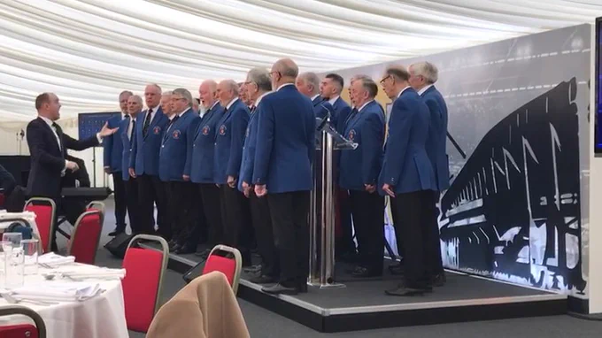 Cardiff Arms Park Choir singing.