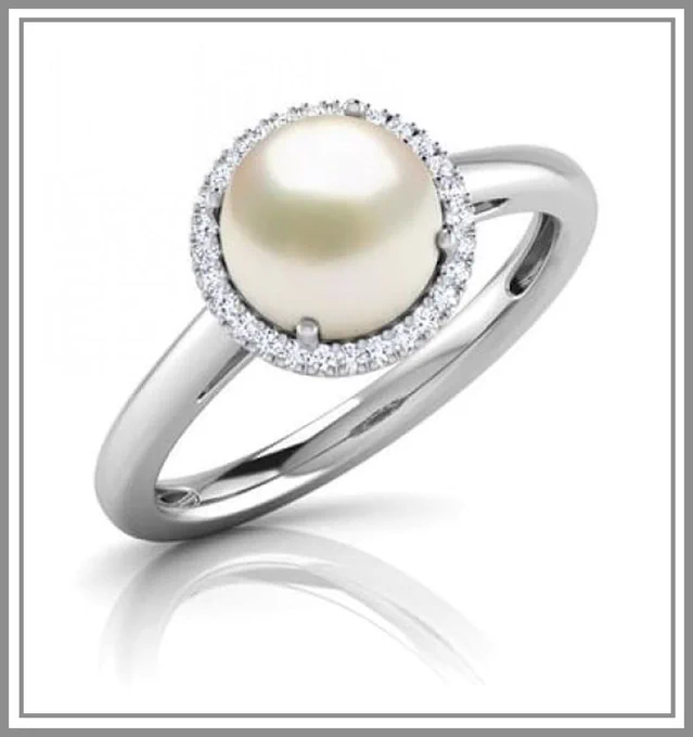 Shop vintage pearl engagement halo diamond ring. A halo of brilliant round diamonds surrounds 0.4 cent each with quality Pearl which sits in a beautiful scalloped cup design. Pearl ring can be an ideal engagement ring by customizing it with meaningful pearl color, side gemstone and metal colors of your choice.
https://www.9gem.com/.../pearl-birthstone-ring-ring0033.html
For Customization Queries contact on whatsapp
https://wa.me/919216113377
