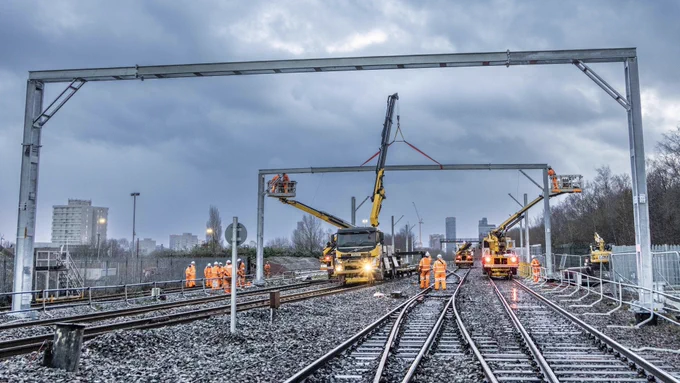 New railway electrification gantries being installed between Manchester and Stalybridge.