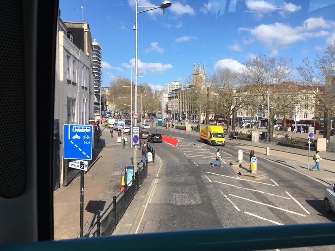 Freshly red painted bus lane. 