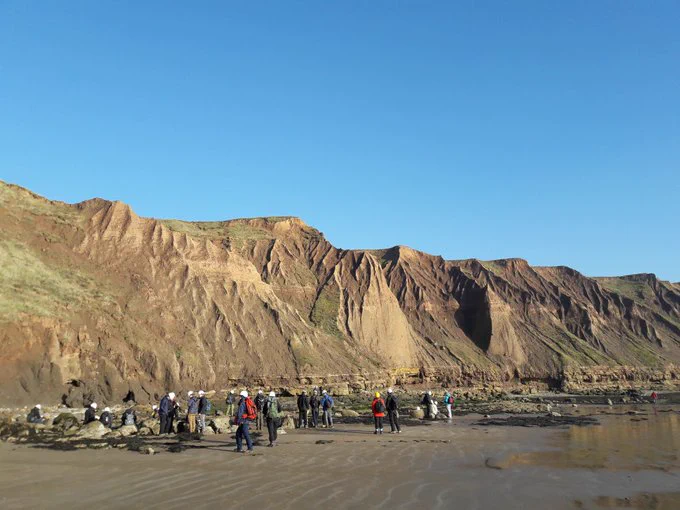 People on the beach near Filey Brigg.
