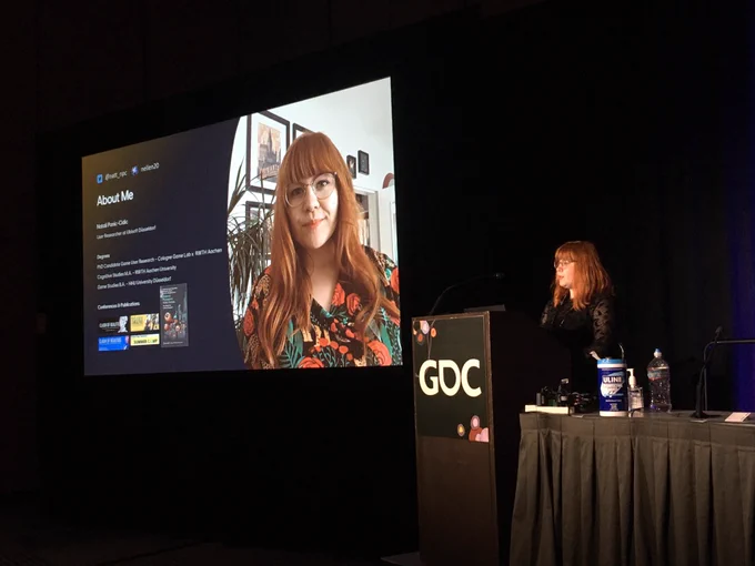Picture of Natali Panic-Cidic presenting her GDC talk.