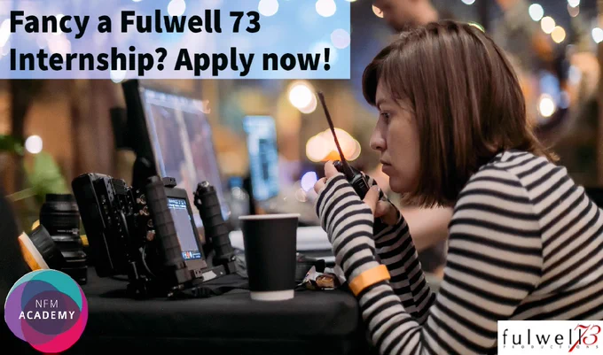 Graphic with dark haired girl in a grey and black stripped top checking radios on set in front of computer screen.