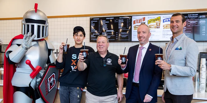 Barry, Student CEO, Burlington County Commissioner, President Cioce and Saxbys President all toasting with cold brew.