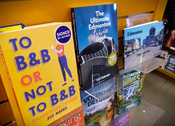 'The Ultimate Edmonton Trivia Book' on a shelf at Indigo South Common