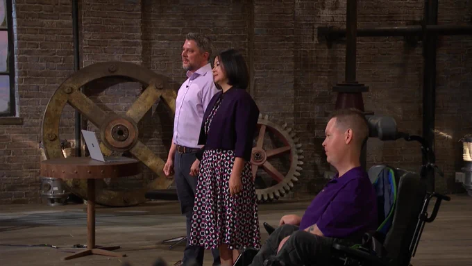  An image of 3 CityMaaS team members all looking in the same direction whilst appearing on a tv show