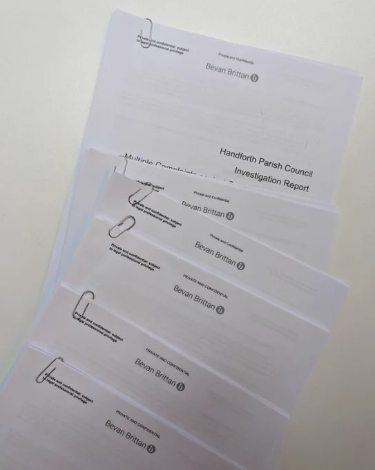 The six reports into Handforth Parish Council on a table