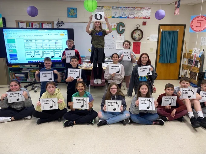 6th Grade music students learn about notes. 