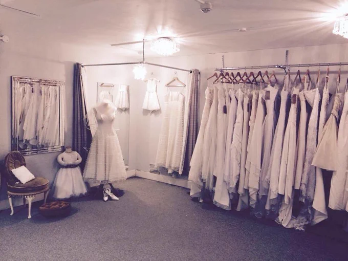 Wedding dressing hanging in a showroom.