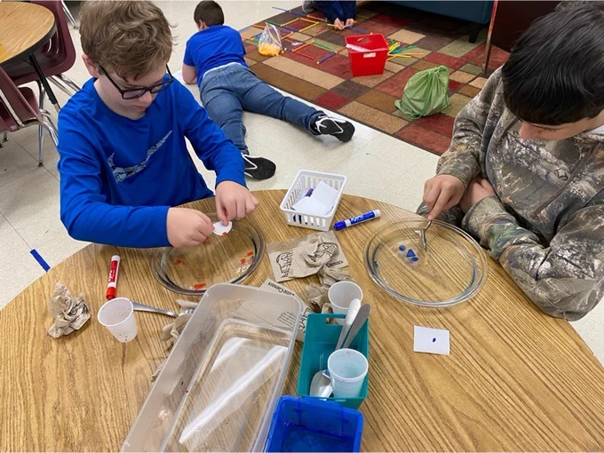 Students test density of dry erase markers