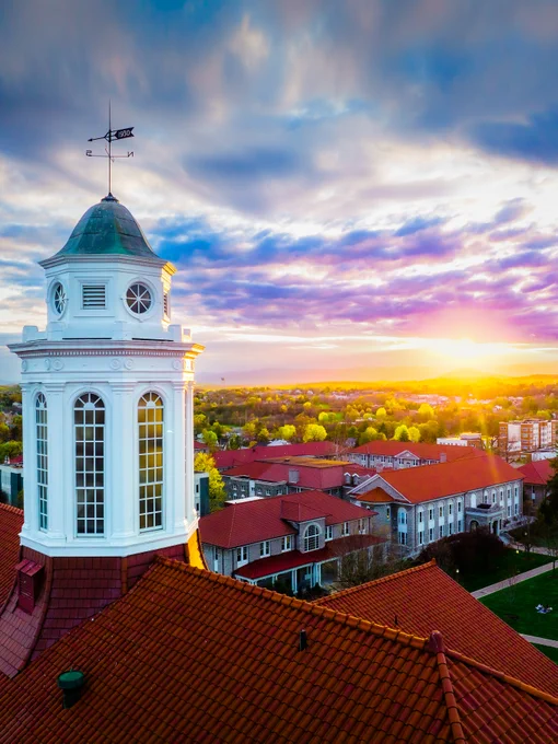 Sunset and colorful clouds over Wilson Hall and the Quad of JMU.