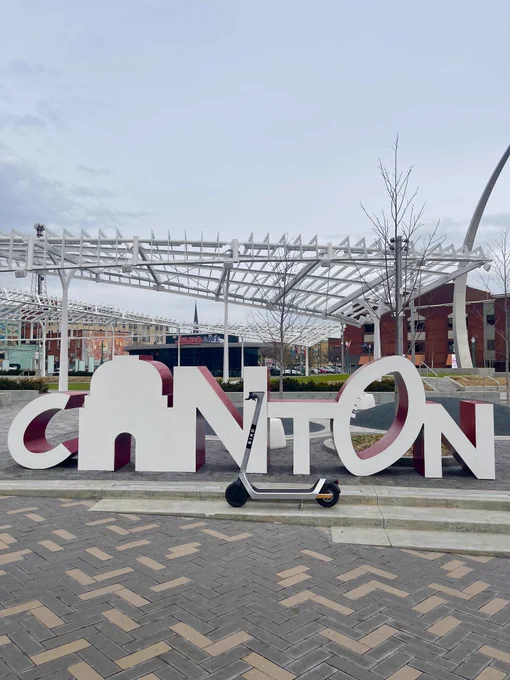 Photo of a Bird scooter in front of a Canton sign. 