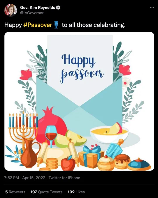 Iowa governor Kim Reynolds wishes followers a Happy Passover with an image of Hanukkah things (a menorah, apple, dreidel, gelt etc)
