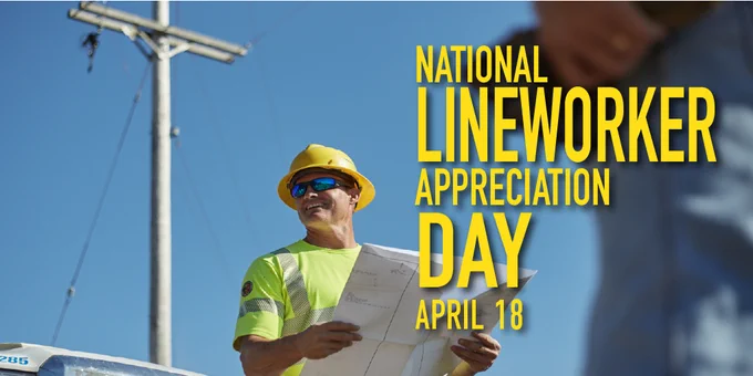 A lineworker on the ground looking at plans. The photo also says National Lineworker Appreciation Day April 18. 