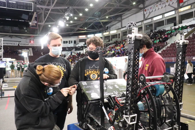 Our team members working on the robot.