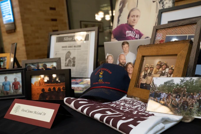 A memorial created for David James McLeod '24. Collections of framed photos include images of Bonfire individuals, and a framed newspaper clipping. A hat from the Dixie Chicken is front and center. 