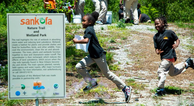Schoolchildren enjoying outdoor recreation activities at the park. Photo courtesy of Sankofa Nola.