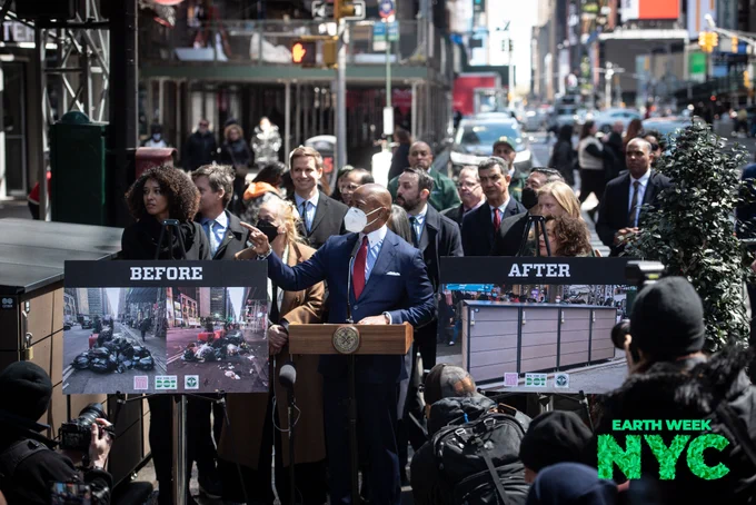 A photo of the Mayor standing at a podium outside with a group of people behind him. Next to the podium are before and after photos of a curb. The before shows trash bags piled randomly. The after shows a large container on the curb.
