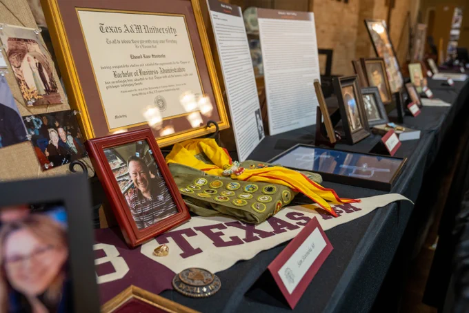 Aggie Muster Reflections Display for Edward Stavinoha '68 surrounded by photos, his degree, his Aggie Ring, Texas A&M banner, and scout uniform.