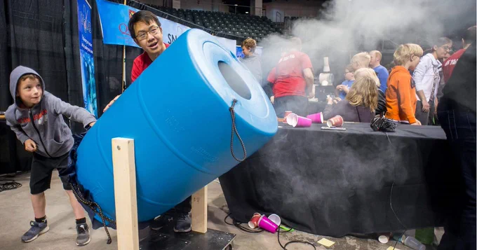 Child participates in hands-on activity during Science Rendezvous Kingston.