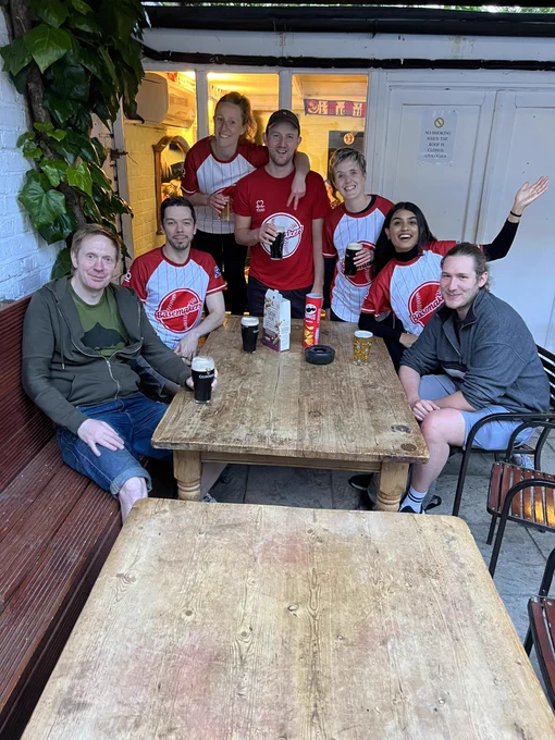 Team basemakers celebrating in the pub