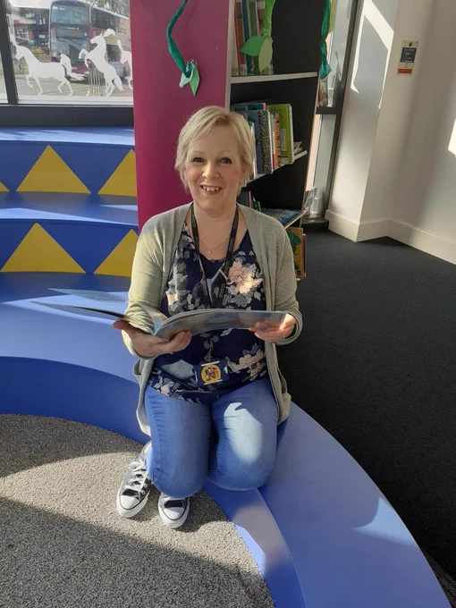 Female member of staff in childrens area Newcastle under Lyme library